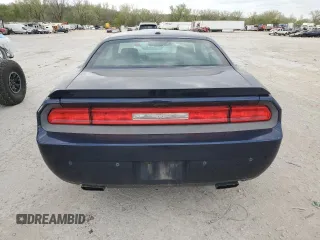 2013 Dodge Challenger R/T z VIN 2C3CDYBT9DH585965, wystawiony jako Copart lot #52995875 z przebiegiem 131 456 mil mil oraz Szkoda całkowita • Salvage title. Historia ofert i sprzedaży dostępna na DreamBid. Obrazek 6.