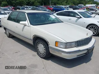 1996 Cadillac DeVille z VIN 1G6KD52Y6TU220885, wystawiony jako IAAI lot #42386470 z przebiegiem 99 031 mil mil oraz . Historia ofert i sprzedaży dostępna na DreamBid. Obrazek 1.