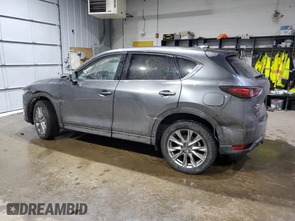 2021 Mazda CX-5 Grand Touring with VIN JM3KFADM5M0428282, listed as a Copart auction lot 42567825 with 33,763 mi miles and Salvage Title. Bid and sale history available at carsss.com. Image 2.