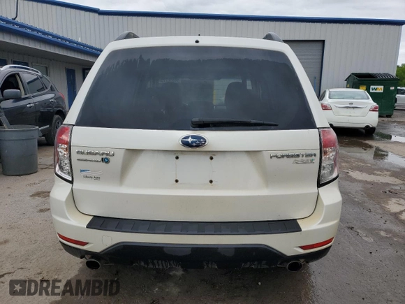 2010 Subaru Forester X Limited with VIN JF2SH6DCXAH772549, listed as a Copart auction lot 58598275 with 142,128 mi miles and Salvage title. Bid and sale history available at DreamBid. Image 6.