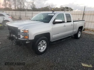 2015 Chevrolet Silverado 1500 LT with VIN 1GCRCREC1FZ431764, listed as a Copart auction lot 80342874 with 143,658 mi miles and Salvage Title. Bid and sale history available at DreamBid. Image 1.