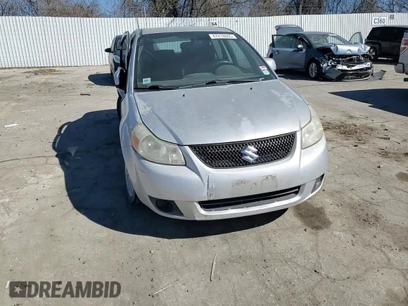 2011 Suzuki SX4 LE with VIN JS2YC5A27B6301040, listed as a Copart auction lot 47218805 with 106,474 mi miles and Salvage Title. Bid and sale history available at carsss.com. Image 11.