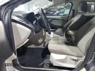 2012 Ford Focus SE z VIN 1FAHP3F28CL444261, wystawiony jako Copart lot #61174145 z przebiegiem 77 612 mil mil oraz Szkoda całkowita • Salvage title. Historia ofert i sprzedaży dostępna na DreamBid. Obrazek 7.