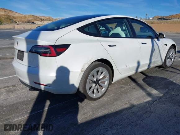 2023 Tesla Model 3 with VIN 5YJ3E1EAXPF486639, listed as a IAAI auction lot 41387797 with 18,603 mi miles and . Bid and sale history available at carsss.com. Image 4.