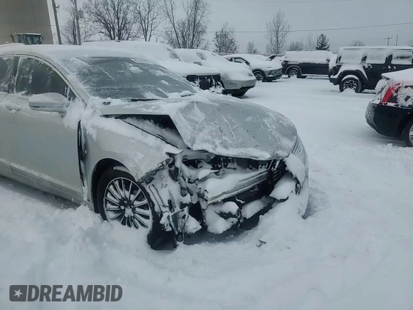 2015 Lincoln MKZ z VIN 3LN6L2JK7FR608177, wystawiony jako Copart lot #85162384 z przebiegiem Nie podano mil oraz Czysty tytuł • Clean title. Historia ofert i sprzedaży dostępna na DreamBid. Obrazek 11.