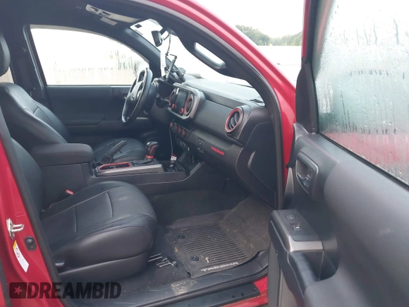 2019 Toyota Tacoma SR5 with VIN 3TMAZ5CN1KM092783, listed as a IAAI auction lot 42181784 with 86,272 mi miles and . Bid and sale history available at DreamBid. Image 5.