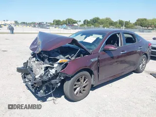 2019 Kia Optima LX with VIN 5XXGT4L34KG323567, listed as a IAAI auction lot 41770143 with 67,910 mi miles. Bid and sale history available at carsss.com. Image 2.