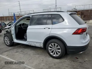 2018 Volkswagen Tiguan S with VIN 3VV1B7AXXJM013468, listed as a Copart auction lot 58371875 with 61,464 mi miles and Salvage title. Bid and sale history available at DreamBid. Image 2.