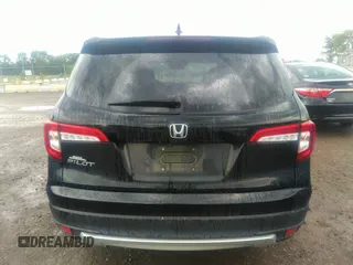 2021 Honda Pilot EX-L with VIN 5FNYF5H50MB011165, listed as a IAAI auction lot 39799892 with 95,040 mi miles and . Bid and sale history available at DreamBid. Image 16.