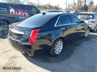 2016 Cadillac CTS Sedan AWD with VIN 1G6AW5SX8G0198009, listed as a IAAI auction lot 41437238 with 54,882 mi miles. Bid and sale history available at carsss.com. Image 4.