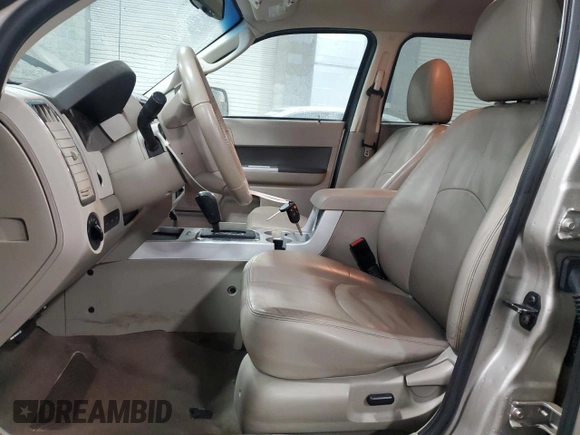 2010 Mercury Mariner Premier with VIN 4M2CN9H74AKJ06777, listed as a Copart auction lot 87920815 with 187,208 mi miles and Salvage title. Bid and sale history available at DreamBid. Image 7.