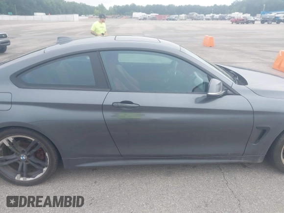 2014 BMW 4 Series 428i with VIN WBA3N7C52EK221929, listed as a IAAI auction lot 42530110 with 126,828 mi miles and . Bid and sale history available at DreamBid. Image 13.