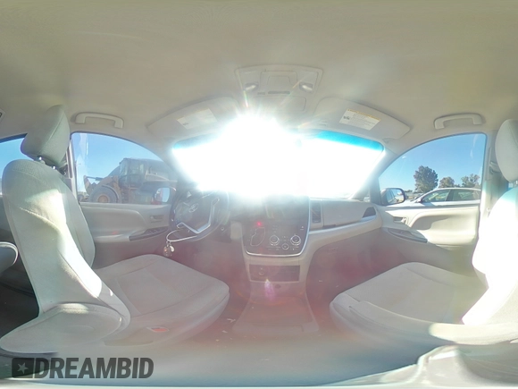 2015 Toyota Sienna L with VIN 5TDZK3DC6FS609767, listed as a Copart auction lot 61188585 with 136,286 mi miles and Salvage title. Bid and sale history available at DreamBid. Image 15.