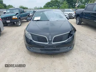 2013 Lincoln MKS EcoBoost with VIN 1LNHL9FT3DG607213, listed as a IAAI auction lot 42686285 with 97,622 mi miles and . Bid and sale history available at DreamBid. Image 12.
