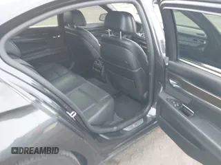 2015 BMW 7 Series 750i xDrive with VIN WBAYB6C56FG299238, listed as a IAAI auction lot 41441393 with 62,396 mi miles. Bid and sale history available at carsss.com. Image 8.