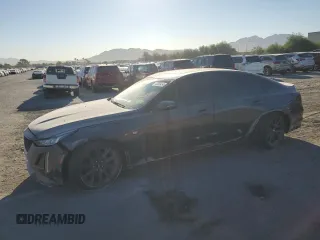 2021 Cadillac CT5 Sport z VIN 1G6DP5RKXM0125028, wystawiony jako Copart lot #73395454 z przebiegiem 25 451 mil mil oraz Szkoda całkowita • Salvage title. Historia ofert i sprzedaży dostępna na DreamBid. Obrazek 1.