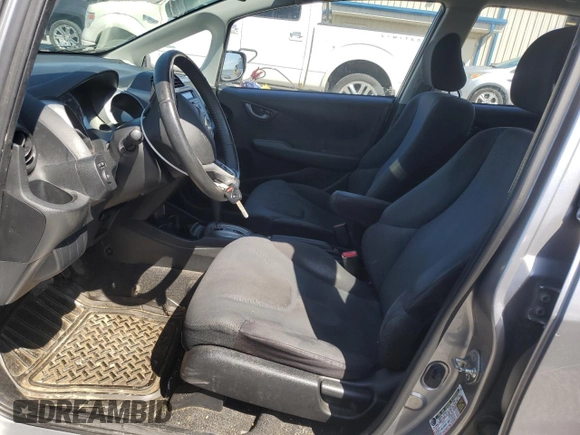 2009 Honda Fit Sport z VIN JHMGE88489S010278, wystawiony jako Copart lot #52251405 z przebiegiem 120 511 mil mil oraz Szkoda całkowita • Salvage title. Historia ofert i sprzedaży dostępna na DreamBid. Obrazek 7.