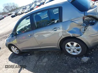 2012 Nissan Versa S with VIN 3N1BC1CP0CK206613, listed as a IAAI auction lot 41836647 with 180,698 mi miles. Bid and sale history available at carsss.com. Image 14.