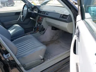 1987 Mercedes-Benz 300 with VIN WDBEA30D8HA397811, listed as a IAAI auction lot 41868336 with 124,720 mi miles. Bid and sale history available at carsss.com. Image 5.