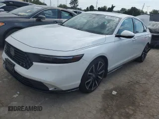 2023 Honda Accord Touring z VIN 1HGCY2F81PA046389, wystawiony jako Copart lot #69194374 z przebiegiem Nie podano mil oraz Szkoda całkowita • Salvage title. Historia ofert i sprzedaży dostępna na DreamBid. Obrazek 1.