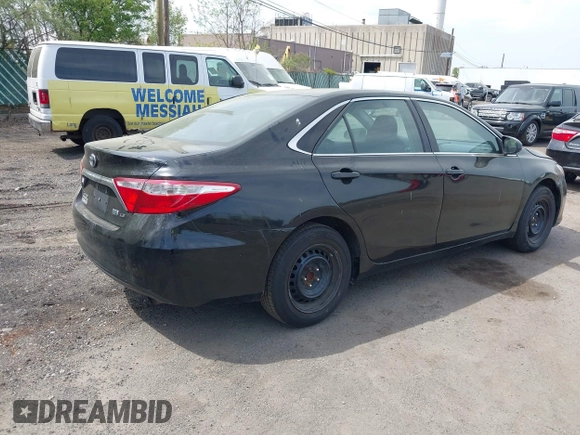 2015 Toyota Camry LE with VIN 4T1BD1FK2FU175455, listed as a IAAI auction lot 42119277 with 199,924 mi miles and . Bid and sale history available at DreamBid. Image 4.