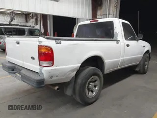 1999 Ford Ranger XL z VIN 1FTYR10CXXUA35916, wystawiony jako IAAI lot #42619208 z przebiegiem 292 615 mil mil oraz . Historia ofert i sprzedaży dostępna na DreamBid. Obrazek 4.