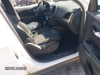 2014 Jeep Cherokee Latitude with VIN 1C4PJMCS9EW309289, listed as a IAAI auction lot 42003252 with 99,360 mi miles and . Bid and sale history available at DreamBid. Image 5.