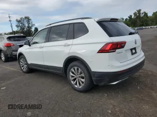 2018 Volkswagen Tiguan S with VIN 3VV0B7AX6JM111232, listed as a Copart auction lot 74944624 with 106,979 mi miles and Salvage Title. Bid and sale history available at DreamBid. Image 2.