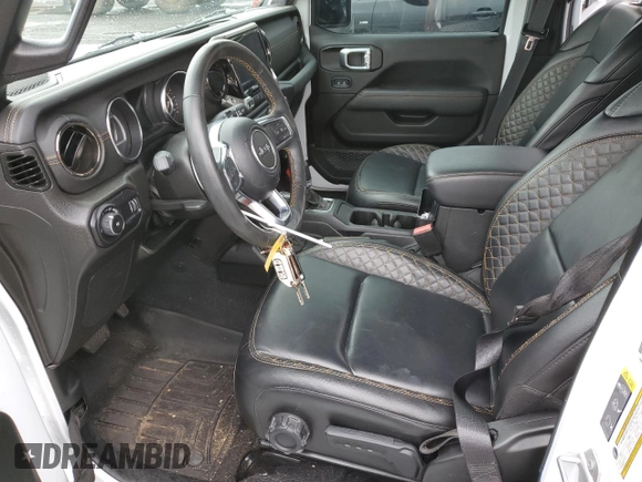 2023 Jeep Wrangler Sahara z VIN 1C4HJXEG9PW544275, wystawiony jako Copart lot #59932585 z przebiegiem 21 382 mil mil oraz Szkoda całkowita • Salvage title. Historia ofert i sprzedaży dostępna na DreamBid. Obrazek 7.