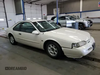 1995 Ford Thunderbird LX with VIN 1FALP62W9SH159185, listed as a Copart auction lot 51862975 with 128,230 mi miles and Clean Title. Bid and sale history available at carsss.com. Image 4.