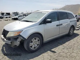 2013 Honda Odyssey LX z VIN 5FNRL5H20DB083213, wystawiony jako Copart lot #55270145 z przebiegiem 183 460 mil mil oraz Szkoda całkowita • Salvage title. Historia ofert i sprzedaży dostępna na DreamBid. Obrazek 1.