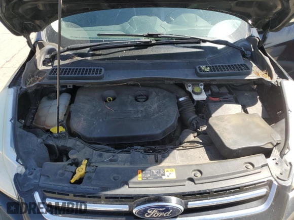 2015 Ford Escape Titanium with VIN 1FMCU0J97FUC80446, listed as a Copart auction lot 58749895 with 106,890 mi miles and Salvage title. Bid and sale history available at DreamBid. Image 12.