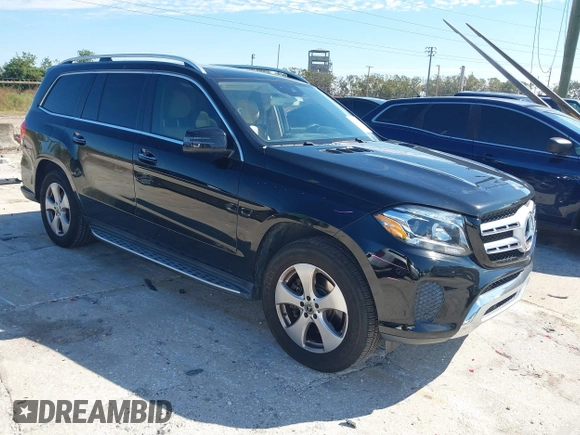 2018 Mercedes-Benz GLS 450 z VIN 4JGDF6EE6JB180836, wystawiony jako IAAI lot #41418271 z przebiegiem 129 115 mil mil oraz . Historia ofert i sprzedaży dostępna na DreamBid. Obrazek 1.