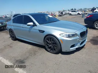 2013 BMW M5 z VIN WBSFV9C57DD096076, wystawiony jako IAAI lot #42359928 z przebiegiem 80 899 mil mil oraz . Historia ofert i sprzedaży dostępna na DreamBid. Obrazek 1.