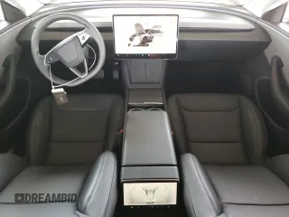 2025 Tesla Model 3 Long Range with VIN 5YJ3E1EA8SF880617, listed as a Copart auction lot 49484815 with 2,625 mi miles and Salvage Title. Bid and sale history available at DreamBid. Image 8.