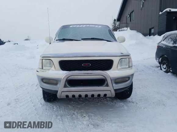 1998 Ford F-150 XL with VIN 2FTRX08L2WCA75995, listed as a Copart auction lot 43717305 with 301,987 mi miles and Salvage title. Bid and sale history available at DreamBid. Image 5.