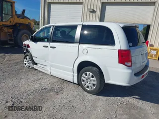 2019 Dodge Grand Caravan SE with VIN 2C7WDGBG7KR803126, listed as a IAAI auction lot 40835937 with 63,100 mi miles and . Bid and sale history available at DreamBid. Image 3.