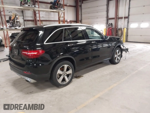 2019 Mercedes-Benz GLC with VIN WDC0G4KB1KV171258, listed as a IAAI auction lot 41895553 with 77,363 mi miles. Bid and sale history available at carsss.com. Image 4.