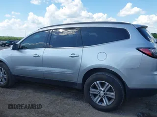 2015 Chevrolet Traverse LT with VIN 1GNKRHKD1FJ359123, listed as a IAAI auction lot 42247341 with 180,189 mi miles and . Bid and sale history available at DreamBid. Image 14.