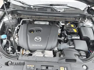 2021 Mazda CX-5 Touring with VIN JM3KFACM6M0480487, listed as a IAAI auction lot 41731646 with 26,951 mi miles and . Bid and sale history available at carsss.com. Image 10.
