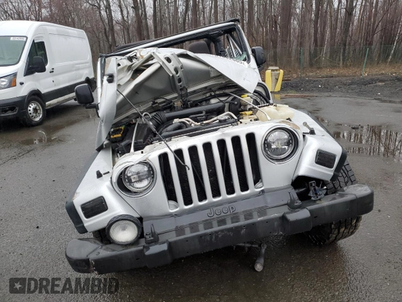 2004 Jeep Wrangler Sport with VIN 1J4FA49S64P767393, listed as a Copart auction lot 51662605 with 165,942 mi miles and Salvage Title. Bid and sale history available at carsss.com. Image 5.