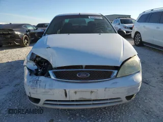 2007 Ford Focus S with VIN 1FAFP34N47W243028, listed as a Copart auction lot 55147695 with 218,672 mi miles and Salvage title. Bid and sale history available at DreamBid. Image 5.