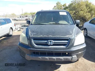 2005 Honda Pilot EX with VIN 5FNYF18455B044034, listed as a IAAI auction lot 42078473 with 265,726 mi miles. Bid and sale history available at carsss.com. Image 11.