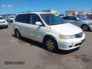 2002 Honda Odyssey EX z VIN 2HKRL18632H554281, wystawiony jako IAAI lot #42246997 z przebiegiem 111 135 mil mil oraz . Historia ofert i sprzedaży dostępna na DreamBid. Obrazek 1.