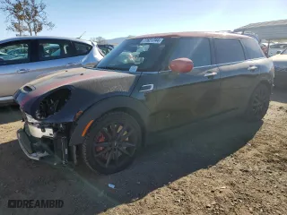 2020 MINI Clubman John Cooper Works with VIN WMWJZ9C06L2M15100, listed as a Copart auction lot 77621744 with 21,705 mi miles and Salvage Title. Bid and sale history available at carsss.com. Image 1.