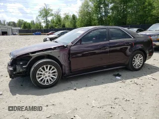 2010 Cadillac CTS Luxury with VIN 1G6DH5EG7A0103076, listed as a Copart auction lot 55219895 with 155,637 mi miles and Salvage title. Bid and sale history available at DreamBid. Image 1.