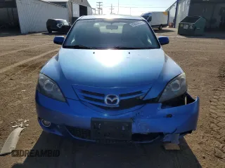 2006 Mazda 3 S Grand Touring with VIN JM1BK343861434940, listed as a Copart auction lot 63624024 with 56,737 mi miles and Salvage Title. Bid and sale history available at DreamBid. Image 5.