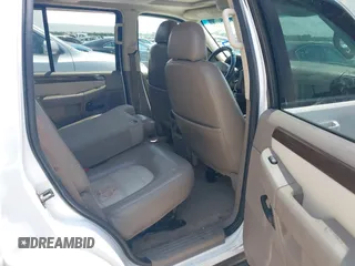2004 Ford Explorer Eddie Bauer z VIN 1FMDU64W14UB35991, wystawiony jako IAAI lot #42663174 z przebiegiem 187 740 mil mil oraz . Historia ofert i sprzedaży dostępna na DreamBid. Obrazek 8.