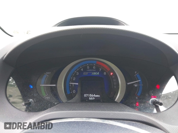 2010 Honda Insight EX with VIN JHMZE2H73AS025856, listed as a IAAI auction lot 42183307 with 71,564 mi miles and . Bid and sale history available at DreamBid. Image 7.