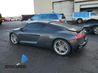 2010 Audi R8 z VIN WUAAUAFG0AN000963, wystawiony jako Copart lot #84955394 z przebiegiem 96 738 mil mil oraz Szkody całkowita. Historia ofert i sprzedaży dostępna na DreamBid. Obrazek 2.